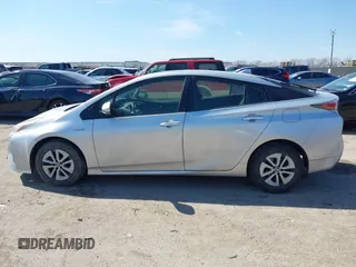 2016 Toyota Prius Four with VIN JTDKARFU9G3004190, listed as a IAAI auction lot 41667279 with 118,216 mi miles. Bid and sale history available at carsss.com. Image 14.