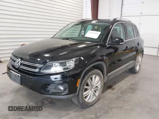 2012 Volkswagen Tiguan SE with VIN WVGBV7AX2CW503301, listed as a IAAI auction lot 42679407 with 90,603 mi miles and . Bid and sale history available at DreamBid. Image 2.