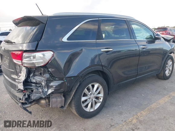 2017 Kia Sorento LX with VIN 5XYPG4A34HG295846, listed as a IAAI auction lot 41712005 with 87,069 mi miles. Bid and sale history available at carsss.com. Image 4.