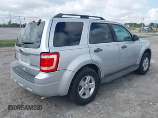 2011 Ford Escape Hybrid with VIN 1FMCU4K3XBKC60103, listed as a IAAI auction lot 42048614 with 125,354 mi miles and . Bid and sale history available at DreamBid. Image 4.