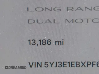 2023 Tesla Model 3 Long Range with VIN 5YJ3E1EBXPF603421, listed as a IAAI auction lot 42105037 with 13,186 mi miles and . Bid and sale history available at DreamBid. Image 15.