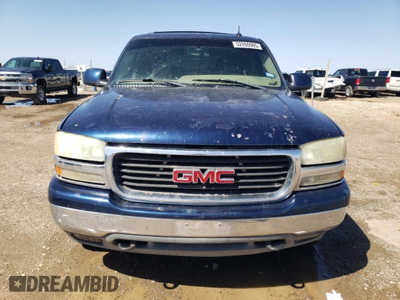 2003 GMC Yukon SLT z VIN 1GKEK13Z53J325679, wystawiony jako Copart lot #52260985 z przebiegiem 320 061 mil mil oraz Czysty tytuł • Clean title. Historia ofert i sprzedaży dostępna na DreamBid. Obrazek 5.