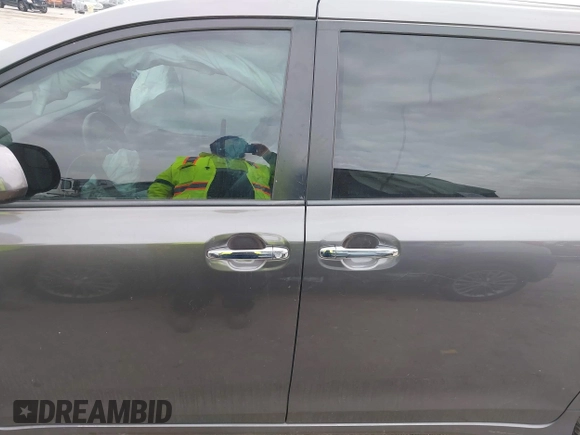 2015 Toyota Sienna SE with VIN 5TDXK3DC8FS652966, listed as a IAAI auction lot 41576611 with 108,858 mi miles and . Bid and sale history available at DreamBid. Image 14.