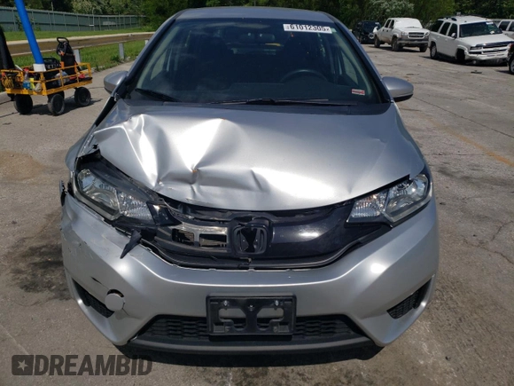 2016 Honda Fit LX z VIN JHMGK5H57GX020610, wystawiony jako Copart lot #61012305 z przebiegiem 99 001 mil mil oraz Szkoda całkowita • Salvage title. Historia ofert i sprzedaży dostępna na DreamBid. Obrazek 5.