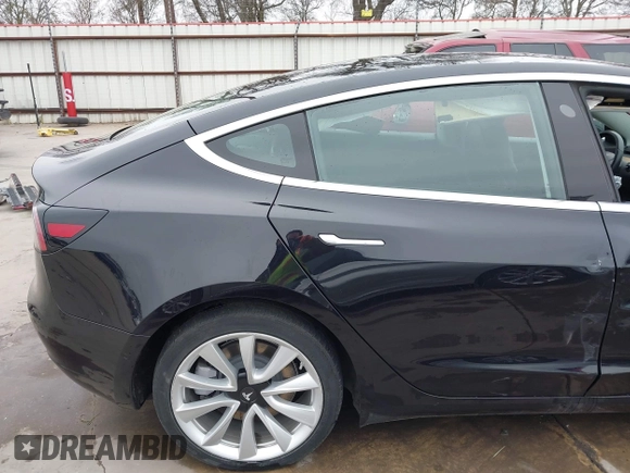 2018 Tesla Model 3 Long Range Battery with VIN 5YJ3E1EB3JF090567, listed as a IAAI auction lot 41568312 with 35,327 mi miles and . Bid and sale history available at DreamBid. Image 21.
