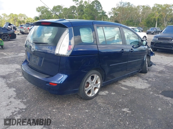 2009 Mazda 5 Sport with VIN JM1CR29L390355978, listed as a IAAI auction lot 41609117 with 118,588 mi miles and . Bid and sale history available at DreamBid. Image 4.