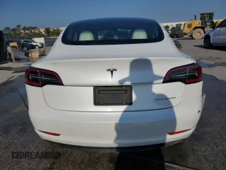 2022 Tesla Model 3 Long Range with VIN 5YJ3E1EB2NF199141, listed as a Copart auction lot 53069145 with 67,140 mi miles and Non Repairable. Bid and sale history available at DreamBid. Image 6.