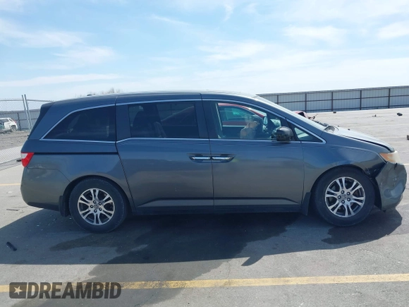 2011 Honda Odyssey EX-L with VIN 5FNRL5H69BB092752, listed as a IAAI auction lot 42245534 with 142,718 mi miles and . Bid and sale history available at DreamBid. Image 13.