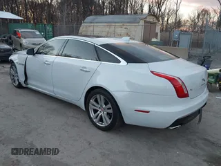 2017 Jaguar XJ with VIN SAJWJ2GD5H8W08395, listed as a IAAI auction lot 41014883 with 80,584 mi miles. Bid and sale history available at carsss.com. Image 3.