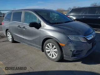 2019 Honda Odyssey LX with VIN 5FNRL6H21KB057139, listed as a IAAI auction lot 41422185 with 128,812 mi miles and . Bid and sale history available at DreamBid. Image 1.