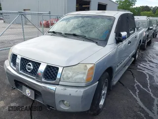 2005 Nissan Titan XE with VIN 1N6AA07A95N511746, listed as a IAAI auction lot 42190947 with 216,306 mi miles and . Bid and sale history available at DreamBid. Image 2.