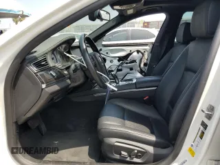 2013 BMW 7 Series 740i with VIN WBAYA6C5XDC995172, listed as a Copart auction lot 60288685 with 28,144 mi miles and Salvage title. Bid and sale history available at DreamBid. Image 7.