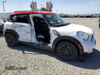 2013 MINI Countryman S ALL4 z VIN WMWZC5C56DWM16296, wystawiony jako Copart lot #56985615 z przebiegiem 63 858 mil mil oraz Szkoda całkowita • Salvage title. Historia ofert i sprzedaży dostępna na DreamBid. Obrazek 4.