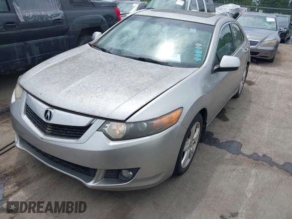 2010 Acura TSX with VIN JH4CU2F60AC019462, listed as a IAAI auction lot 42109261 with 112,131 mi miles. Bid and sale history available at carsss.com. Image 2.