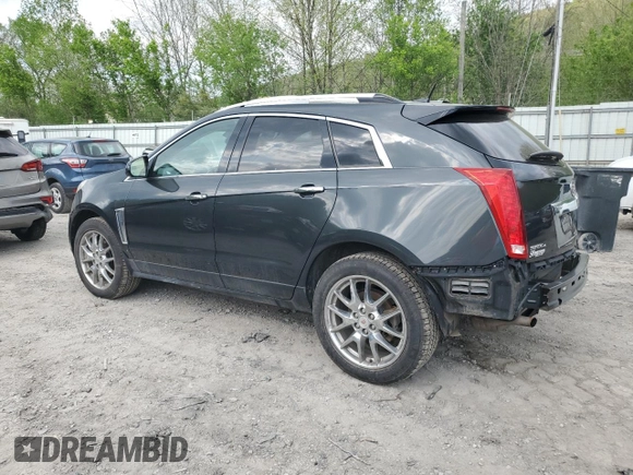2014 Cadillac SRX Premium Collection with VIN 3GYFNGE3XES560903, listed as a Copart auction lot 52529525 with 117,780 mi miles and Salvage title. Bid and sale history available at DreamBid. Image 2.