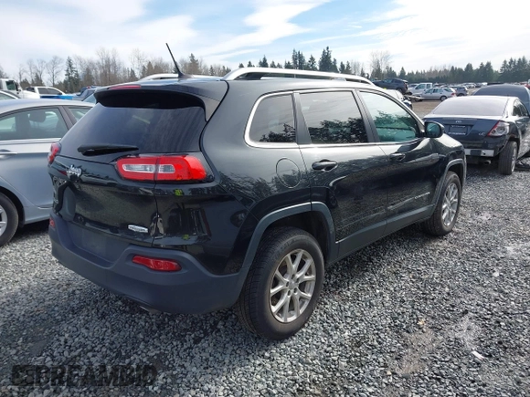 2014 Jeep Cherokee Latitude with VIN 1C4PJMCS0EW169696, listed as a IAAI auction lot 41647691 with 98,919 mi miles. Bid and sale history available at carsss.com. Image 4.