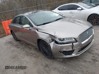 2018 Lincoln MKZ Hybrid Reserve z VIN 3LN6L5MU2JR602228, wystawiony jako IAAI lot #41441004 z przebiegiem 71 047 mil mil oraz . Historia ofert i sprzedaży dostępna na DreamBid. Obrazek 1.