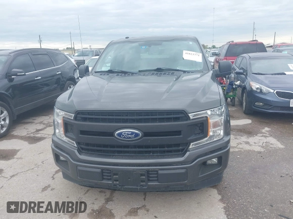 2018 Ford F-150 XL with VIN 1FTMF1C53JKE85608, listed as a IAAI auction lot 41823771 with 142,151 mi miles. Bid and sale history available at carsss.com. Image 6.