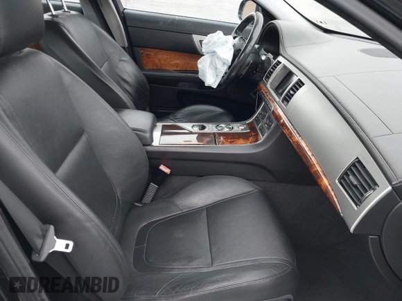 2013 Jaguar XF I4 RWD with VIN SAJWA0ES0DPS64027, listed as a IAAI auction lot 41569121 with 103,115 mi miles. Bid and sale history available at carsss.com. Image 5.