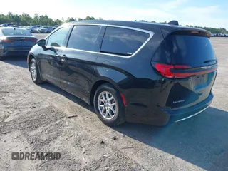 2023 Chrysler Pacifica Touring L with VIN 2C4RC1BG1PR606566, listed as a IAAI auction lot 42615498 with 42,980 mi miles and . Bid and sale history available at DreamBid. Image 3.
