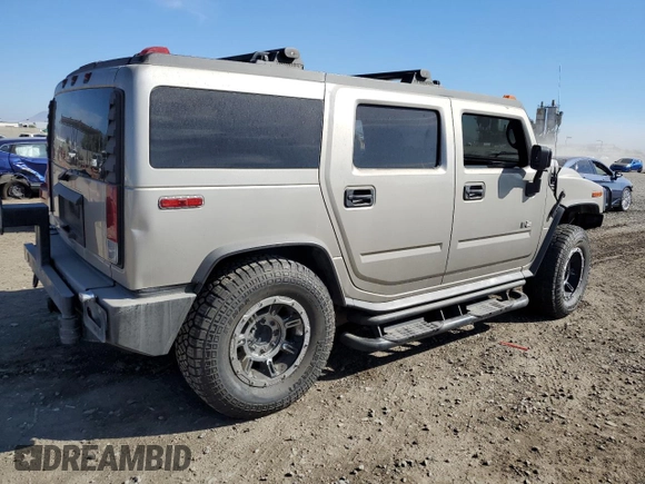 2005 Hummer H2 SUV with VIN 5GRGN23U85H113194, listed as a Copart auction lot 78012304 with 148,940 mi miles and Salvage Title. Bid and sale history available at carsss.com. Image 3.