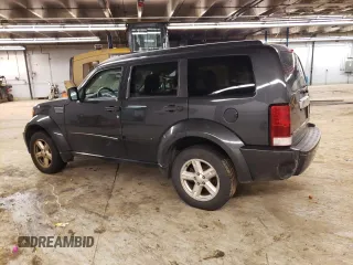 2011 Dodge Nitro SXT z VIN 1D4PT5GK1BW544942, wystawiony jako Copart lot #79857243 z przebiegiem 128 613 mil mil oraz Czysty tytuł • Clean title. Historia ofert i sprzedaży dostępna na DreamBid. Obrazek 2.