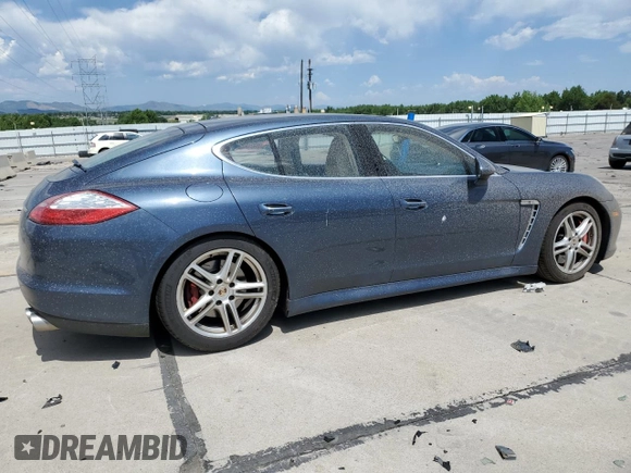 2010 Porsche Panamera Turbo with VIN WP0AC2A70AL090897, listed as a Copart auction lot 60986335 with 120,334 mi miles and Salvage title. Bid and sale history available at DreamBid. Image 3.