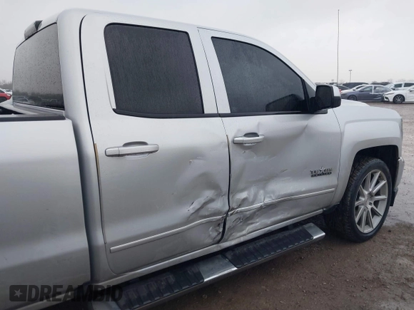 2018 Chevrolet Silverado 1500 LT with VIN 1GCRCREC4JZ287085, listed as a IAAI auction lot 41450057 with 79,275 mi miles and . Bid and sale history available at DreamBid. Image 6.
