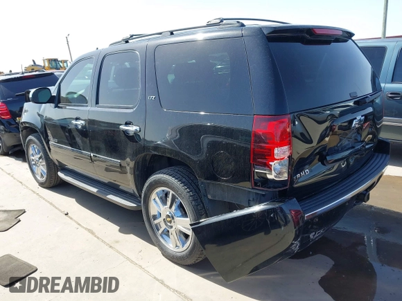 2009 Chevrolet Tahoe LTZ z VIN 1GNFC33J69R285570, wystawiony jako IAAI lot #41701424 z przebiegiem 165 811 mil mil oraz . Historia ofert i sprzedaży dostępna na DreamBid. Obrazek 3.
