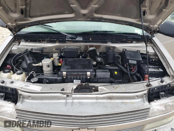 2003 Chevrolet Astro z VIN 1GNEL19X33B102489, wystawiony jako Copart lot #55686585 z przebiegiem 200 050 mil mil oraz Szkody całkowita. Historia ofert i sprzedaży dostępna na DreamBid. Obrazek 12.