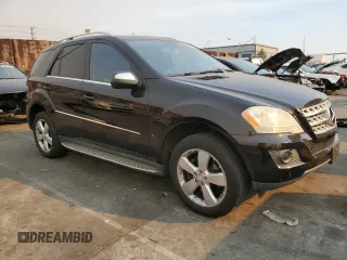 2009 Mercedes-Benz M 3.5L with VIN 4JGBB56E49A525018, listed as a Copart auction lot 41614175 with 154,428 mi miles and Salvage Title. Bid and sale history available at carsss.com. Image 4.