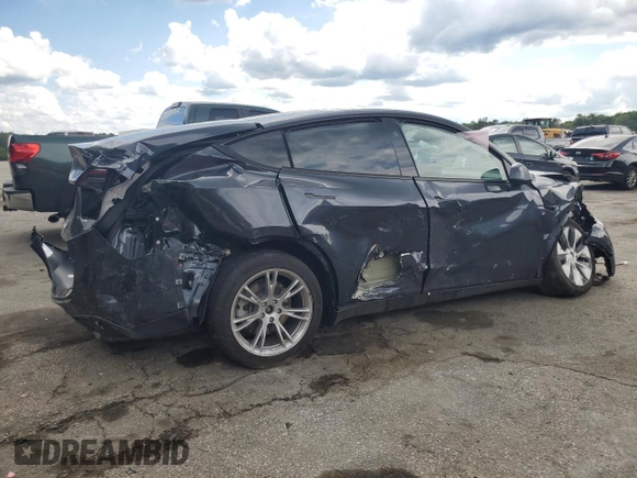 2024 Tesla Model Y Long Range с VIN 7SAYGDEE7RA271520, выставлен на аукционе Copart как лот 56526025 с пробегом 28 745 миль миль и Списание • Salvage title. История ставок и продаж доступна на DreamBid. Изображение 3.
