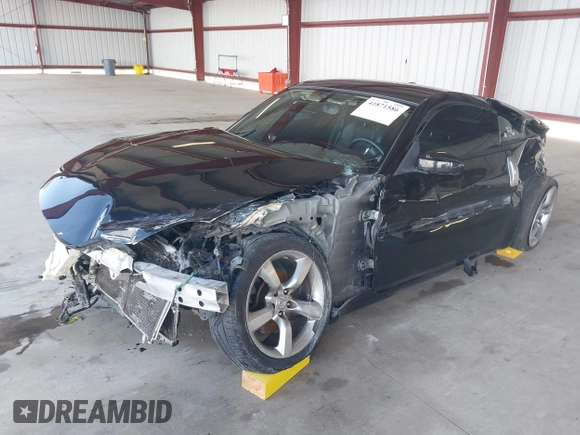 2008 Nissan 350Z z VIN JN1BZ34D98M705867, wystawiony jako IAAI lot #41871586 z przebiegiem 90 717 mil mil oraz . Historia ofert i sprzedaży dostępna na DreamBid. Obrazek 2.