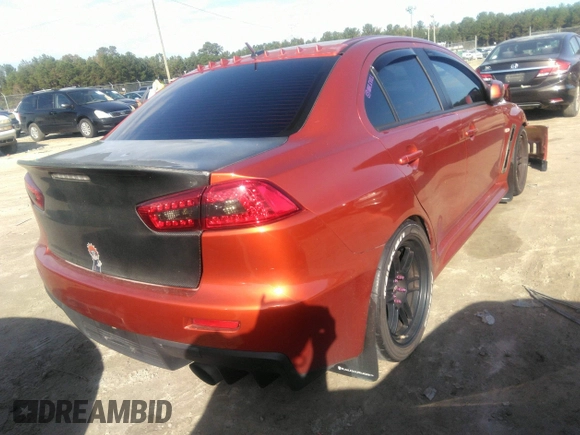 2010 Mitsubishi Lancer Evolution GSR with VIN JA32W8FV7AU003558, listed as a IAAI auction lot 40856259 with 123,639 mi miles and . Bid and sale history available at DreamBid. Image 4.