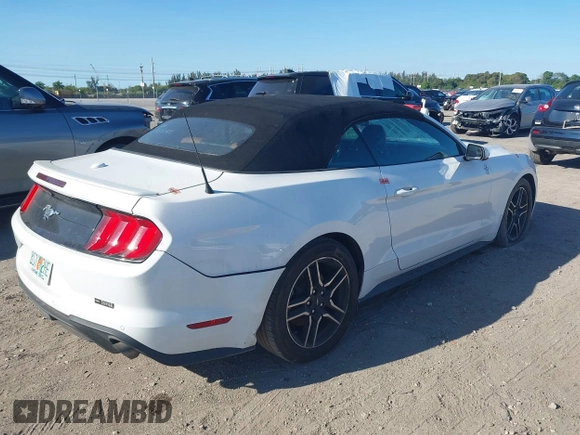 2019 Ford Mustang EcoBoost z VIN 1FATP8UH8K5162526, wystawiony jako IAAI lot #41846704 z przebiegiem 84 527 mil mil oraz . Historia ofert i sprzedaży dostępna na DreamBid. Obrazek 4.