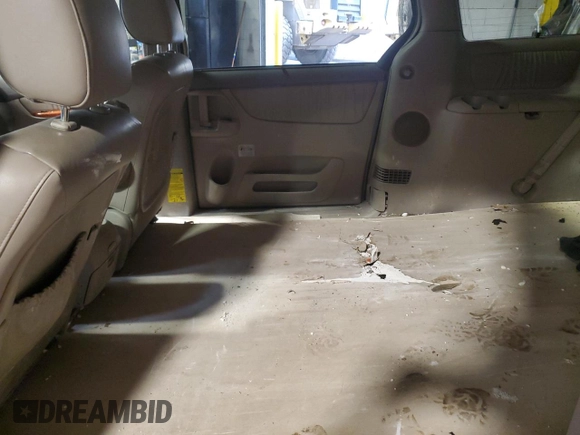 2009 Toyota Sienna XLE with VIN 5TDZK22C19S228023, listed as a Copart auction lot 57072295 with 148,080 mi miles and Salvage title. Bid and sale history available at DreamBid. Image 11.