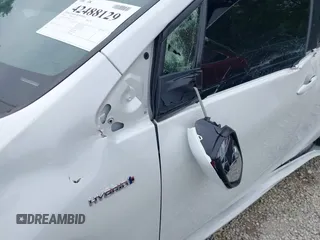 2021 Toyota Prius L Eco with VIN JTDKAMFU6M3137679, listed as a IAAI auction lot 42488129 with 52,414 mi miles and . Bid and sale history available at DreamBid. Image 20.