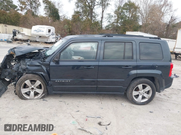 2014 Jeep Patriot Latitude with VIN 1C4NJRFB3ED551622, listed as a IAAI auction lot 40917179 with 109,856 mi miles. Bid and sale history available at carsss.com. Image 14.