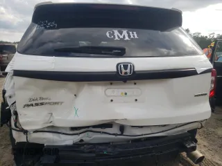 2021 Honda Passport Touring z VIN 5FNYF7H91MB015479, wystawiony jako Copart lot #56127214 z przebiegiem 28 039 mil mil oraz Szkoda całkowita • Salvage title. Historia ofert i sprzedaży dostępna na DreamBid. Obrazek 6.