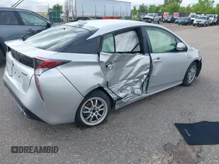 2017 Toyota Prius Two with VIN JTDKBRFU0H3037920, listed as a IAAI auction lot 42356304 with 155,485 mi miles and . Bid and sale history available at DreamBid. Image 4.