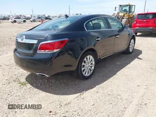 2013 Buick LaCrosse Premium 1 z VIN 1G4GF5E34DF264852, wystawiony jako IAAI lot #42272513 z przebiegiem 125 382 mil mil oraz . Historia ofert i sprzedaży dostępna na DreamBid. Obrazek 4.