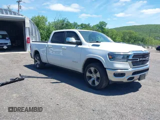 2021 Ram 1500 Laramie with VIN 1C6SRFRTXMN682089, listed as a IAAI auction lot 42299766 with 81,665 mi miles and . Bid and sale history available at DreamBid. Image 1.