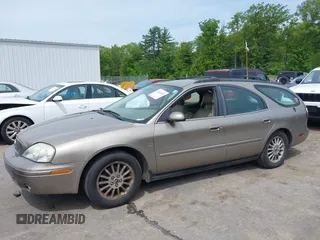 2004 Mercury Sable LS Premium z VIN 1MEHM59S34A626679, wystawiony jako IAAI lot #42364055 z przebiegiem 98 760 mil mil oraz . Historia ofert i sprzedaży dostępna na DreamBid. Obrazek 12.