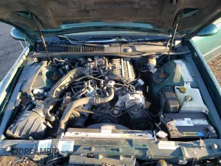 1995 Ford Thunderbird LX z VIN 1FALP6248SH176946, wystawiony jako Copart lot #74066554 z przebiegiem 72 666 mil mil oraz Szkoda całkowita • Salvage title. Historia ofert i sprzedaży dostępna na DreamBid. Obrazek 13.