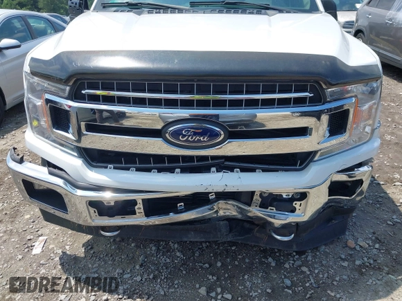 2018 Ford F-150 XL with VIN 1FTEX1EP9JFC22628, listed as a IAAI auction lot 42463357 with 93,331 mi miles and . Bid and sale history available at DreamBid. Image 6.
