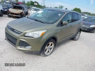 2013 Ford Escape SE with VIN 1FMCU9GX7DUC32369, listed as a IAAI auction lot 42144967 with 156,275 mi miles and . Bid and sale history available at DreamBid. Image 2.