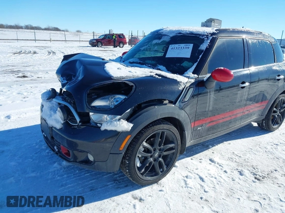 2011 MINI Countryman S with VIN WMWZC5C50BWL55234, listed as a IAAI auction lot 41323339 with 134,709 mi miles and . Bid and sale history available at DreamBid. Image 6.