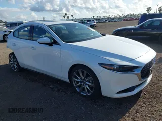2020 Mazda 3 Premium with VIN 3MZBPAEM3LM132772, listed as a IAAI auction lot 42067269 with 53,751 mi miles and . Bid and sale history available at DreamBid. Image 1.