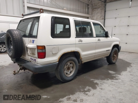 1994 Isuzu Trooper z VIN JACDH58V9R7919182, wystawiony jako IAAI lot #42333093 z przebiegiem 192 819 mil mil oraz . Historia ofert i sprzedaży dostępna na DreamBid. Obrazek 4.