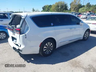 2022 Chrysler Pacifica Hybrid Limited with VIN 2C4RC1S74NR112960, listed as a IAAI auction lot 41584818 with 22,040 mi miles and . Bid and sale history available at DreamBid. Image 4.
